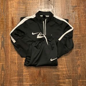Black Nike Dri-Fit sweatsuit.